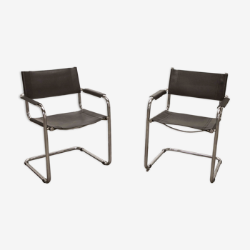 Paire de fauteuils noirs