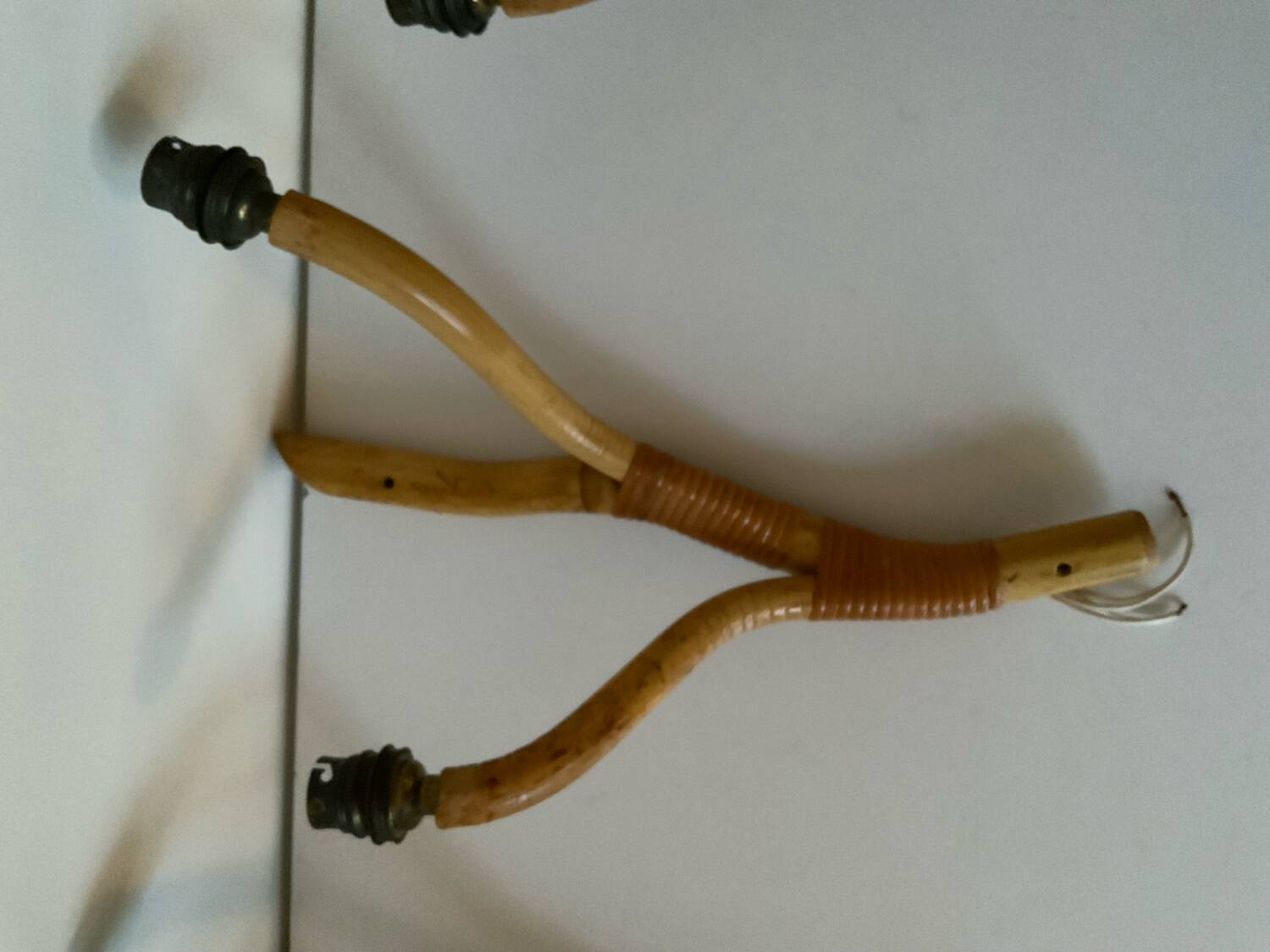 Rattan wall light trio