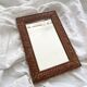 Antique mercury glass barber mirror and carved wooden frame