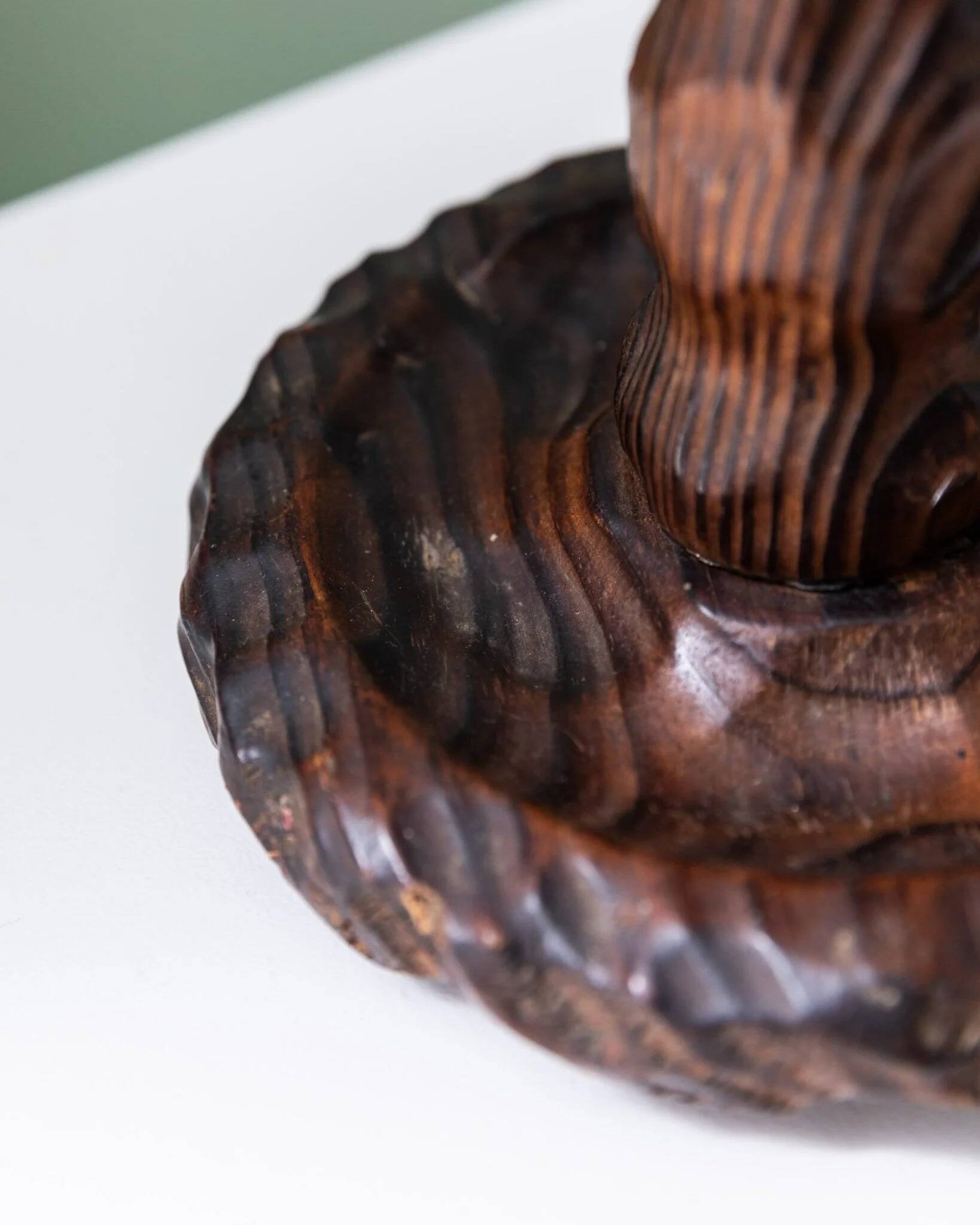 Brutalist carved wood candle holder, dark brown with lighter highlights, made in Italy, 1940s