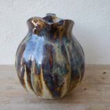 Ceramic pitcher in the shape of a coloquinte melo.