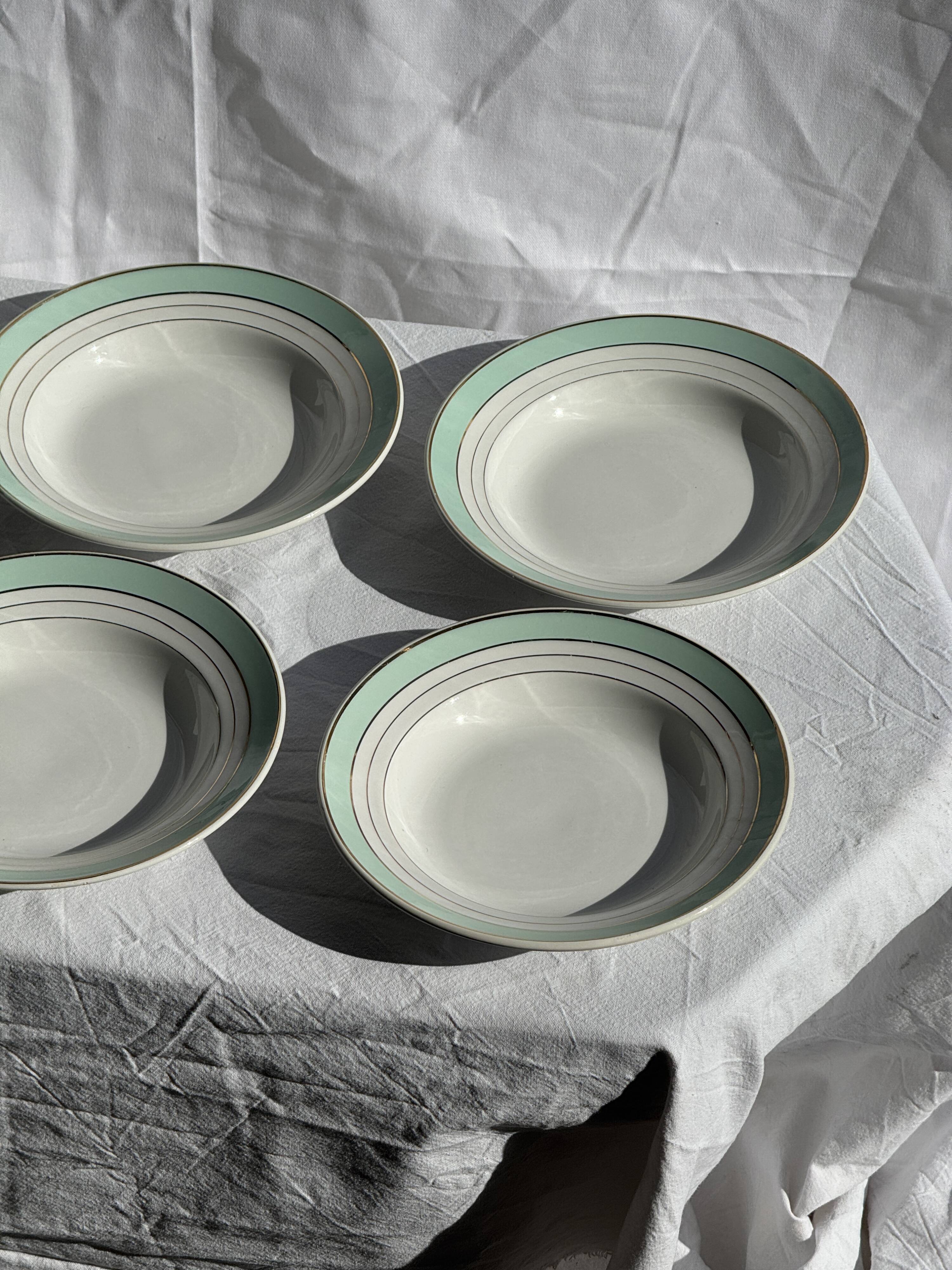 Set of 8 antique turquoise deep plates with a gold rim D22.5