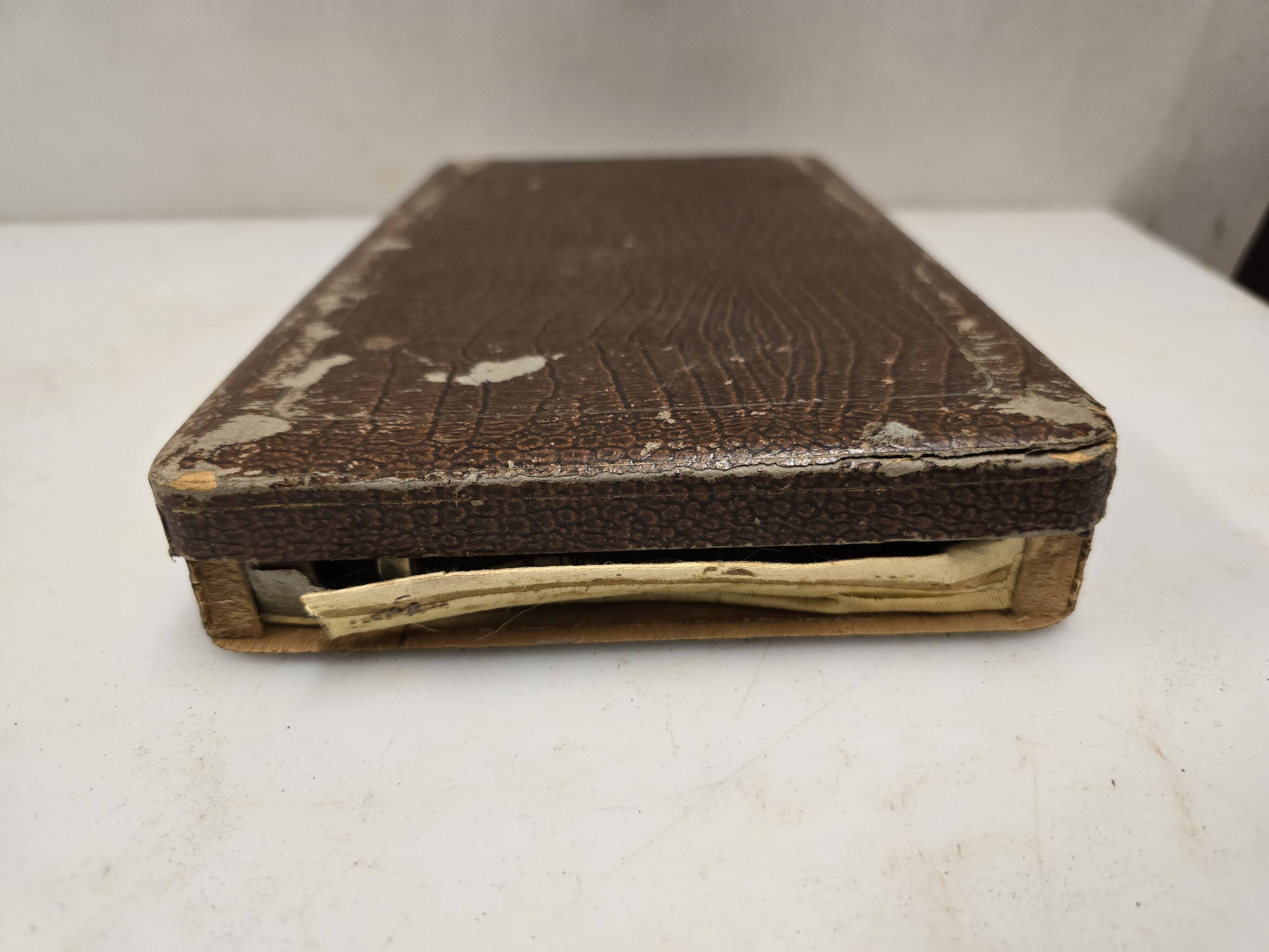 12 silver-plated knives from the mid-20th century