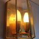 Pair of Italian gold-plated brass wall sconces with beveled glass
