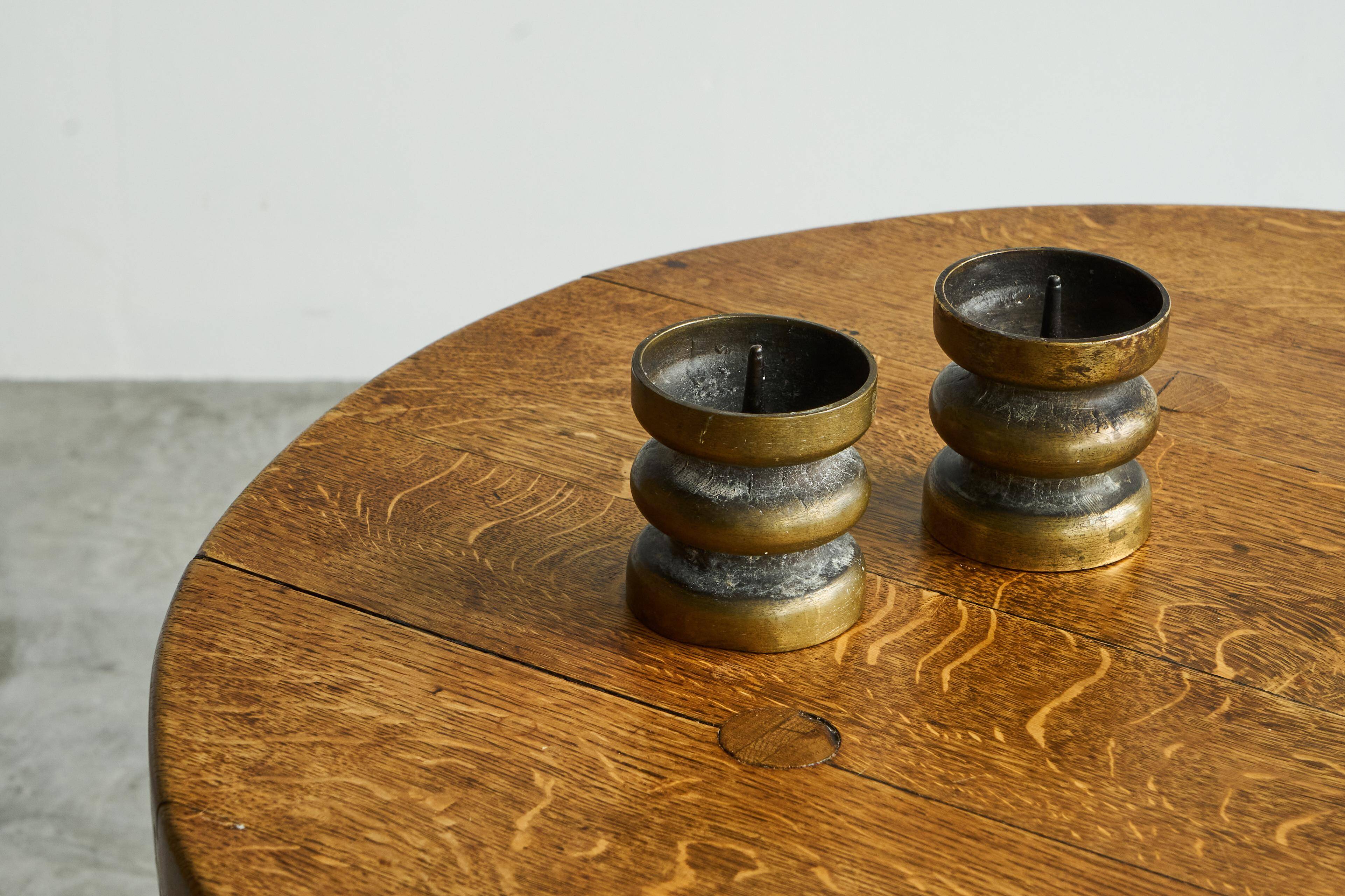 Brutalist pair of patinated bronze candle holders, 1960s