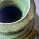 Ancient vase in glazed terracotta with green glaze.