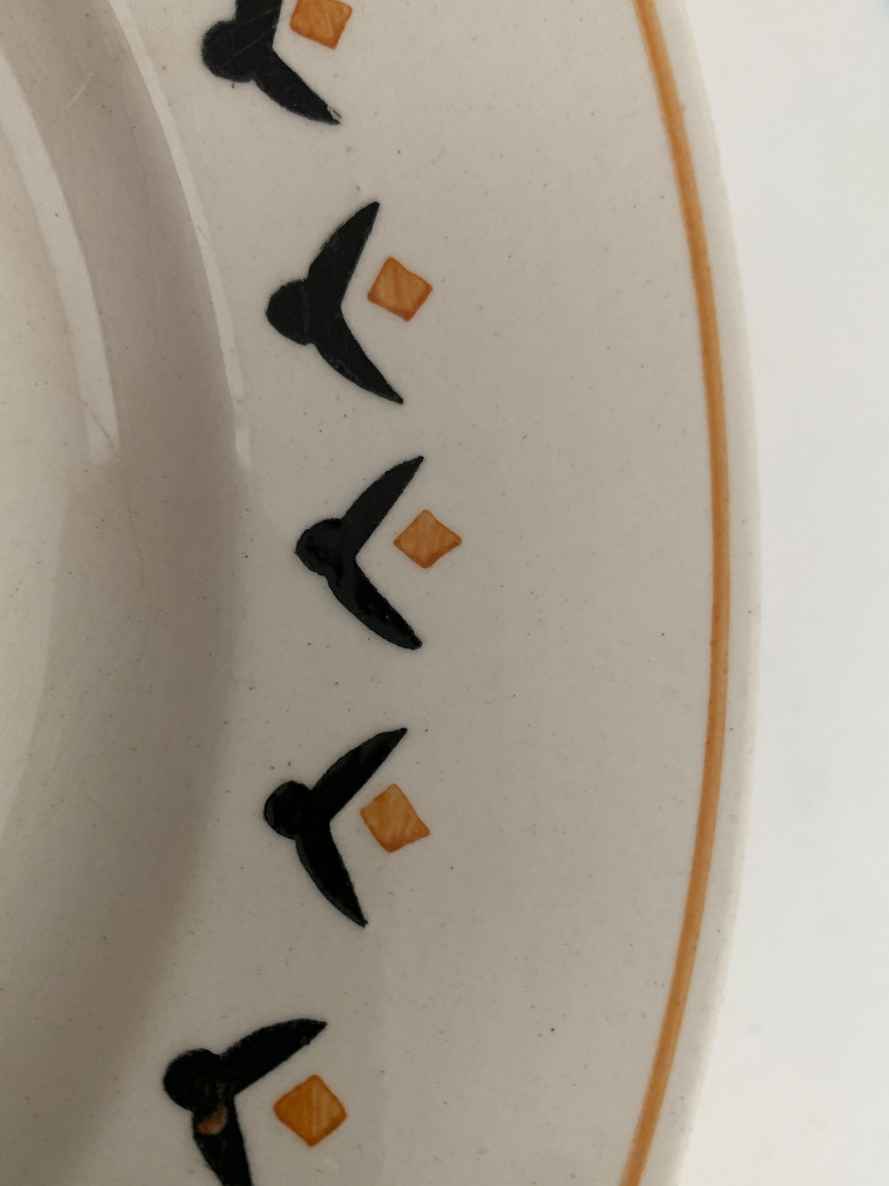 7 dessert plates and one Longwy dish