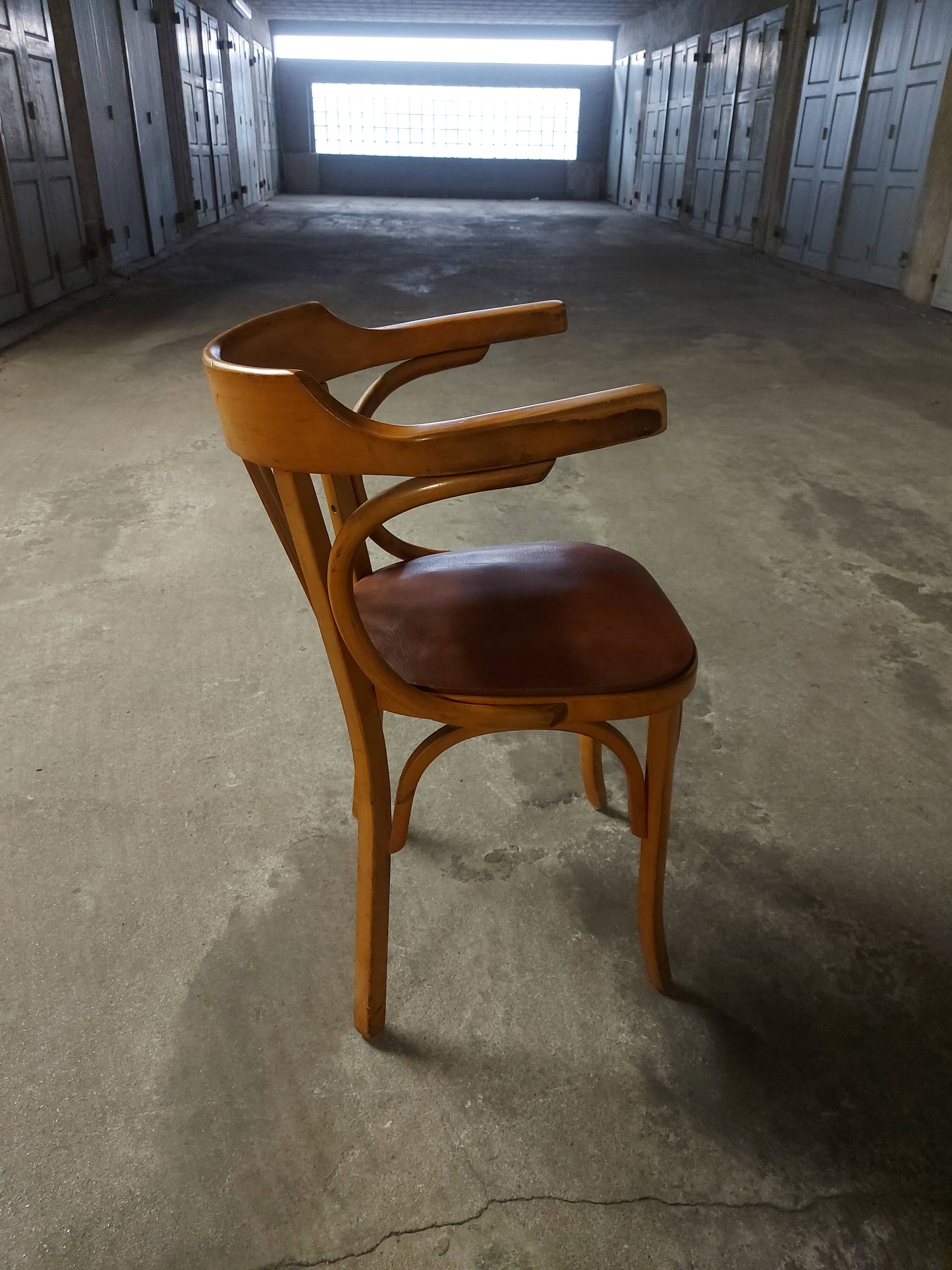 Fauteuil vintage en bois Baumann