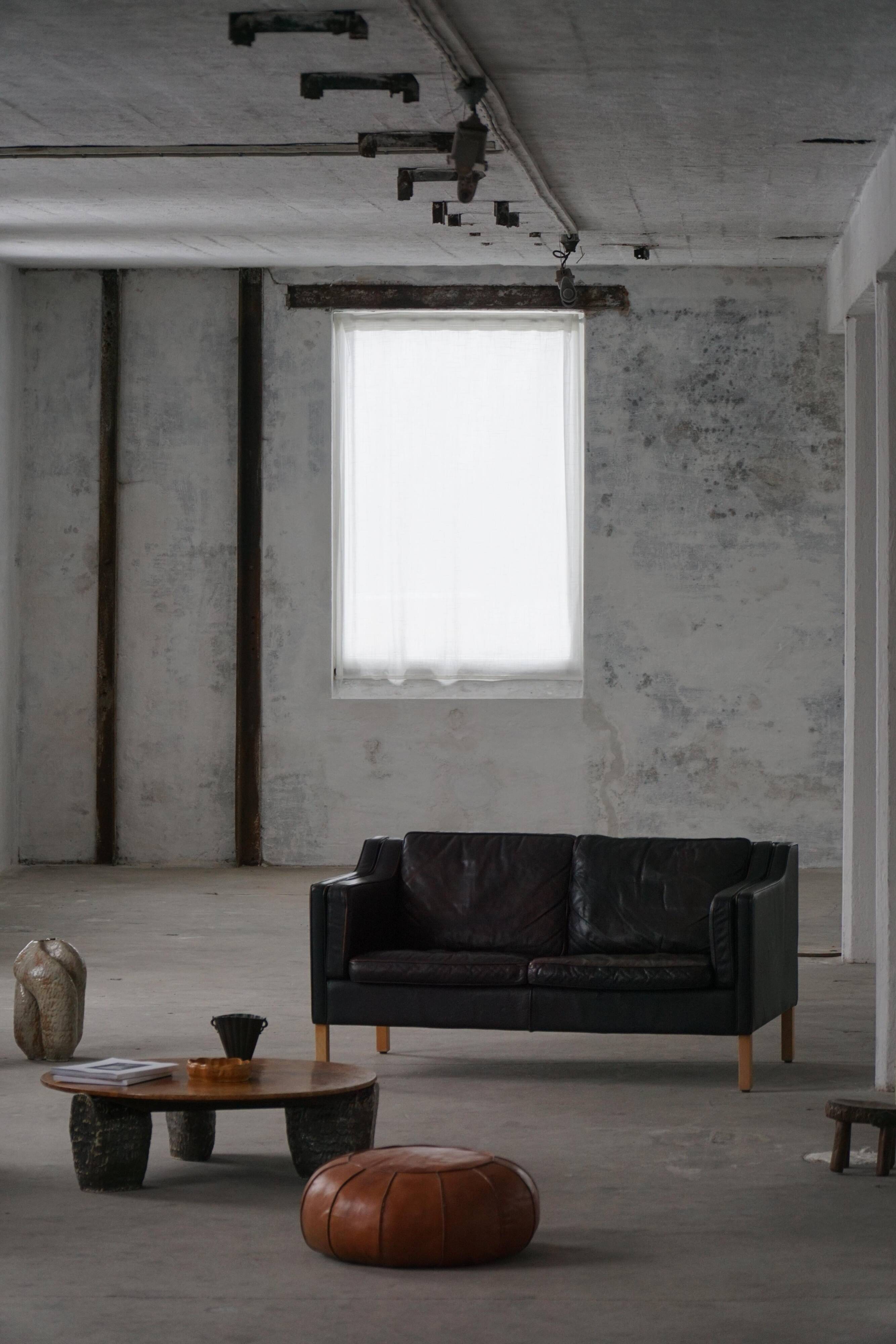 Mogens Hansen, 2-seater canapé mid-century, patinated black leather, 1970s.