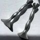 Pair of wavy aluminium candle holders