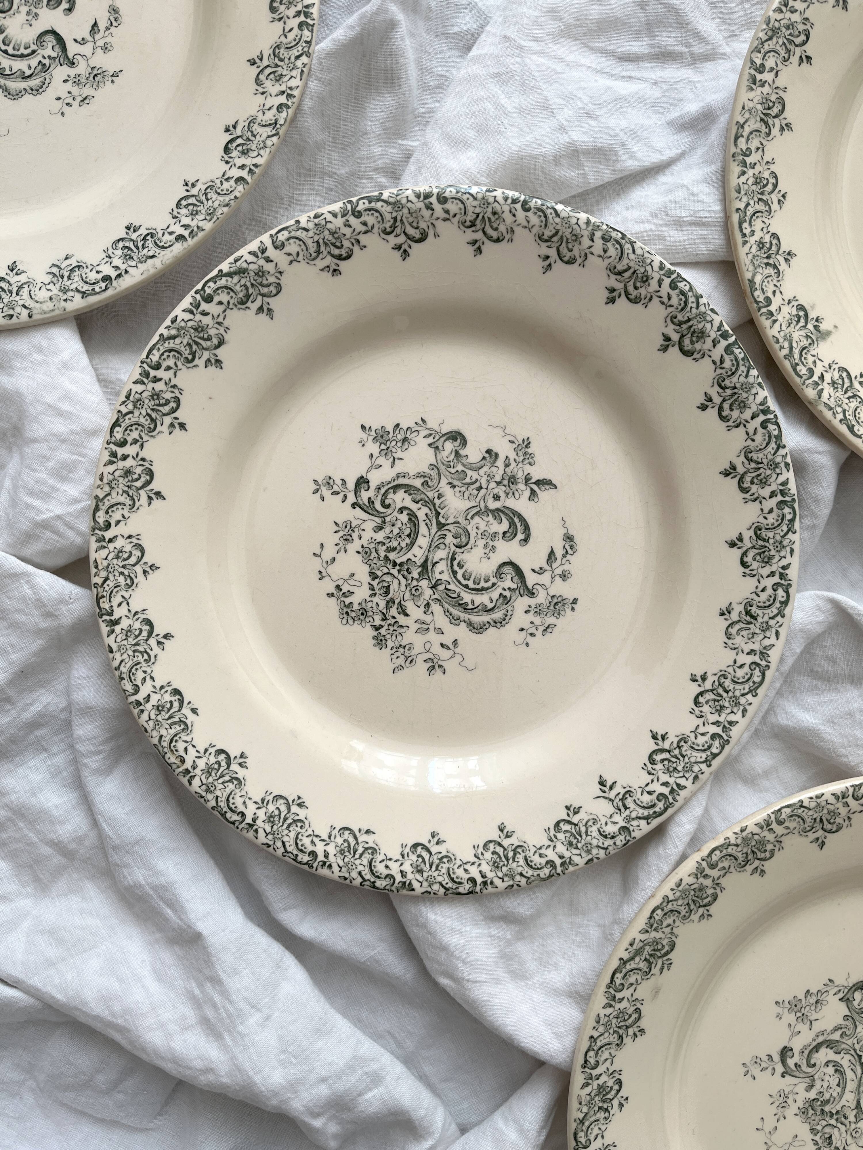 4 flat ironware plates "Louis XV" Gien 19th century