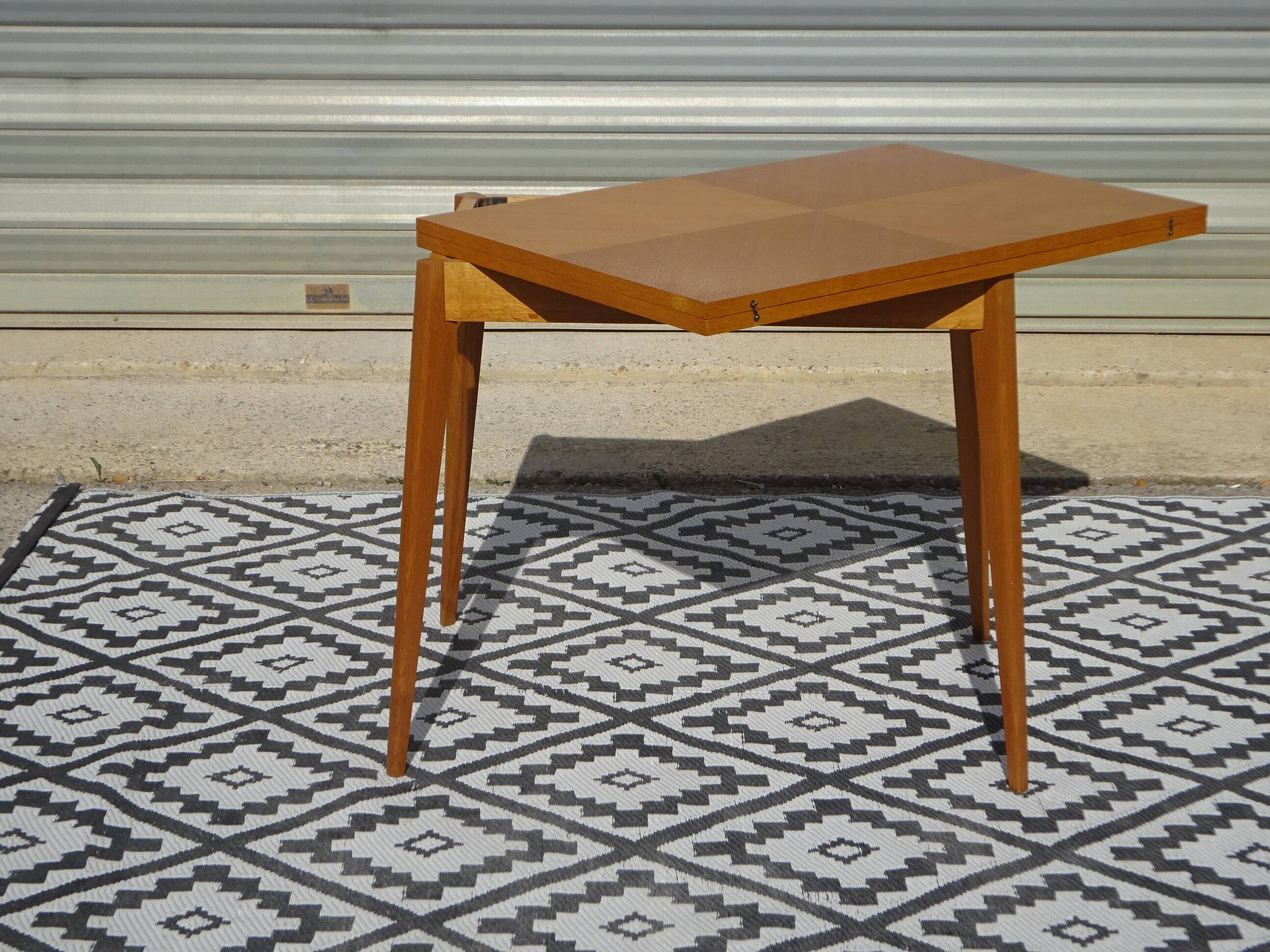 Scandinavian portfolio table model "half-century" by SAM