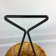 Black metal rattan trash can on 1960