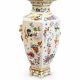 Porcelain vase with flower decorations by Dawen Wang.