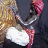 Centerpiece (empty pocket) in resin with African character