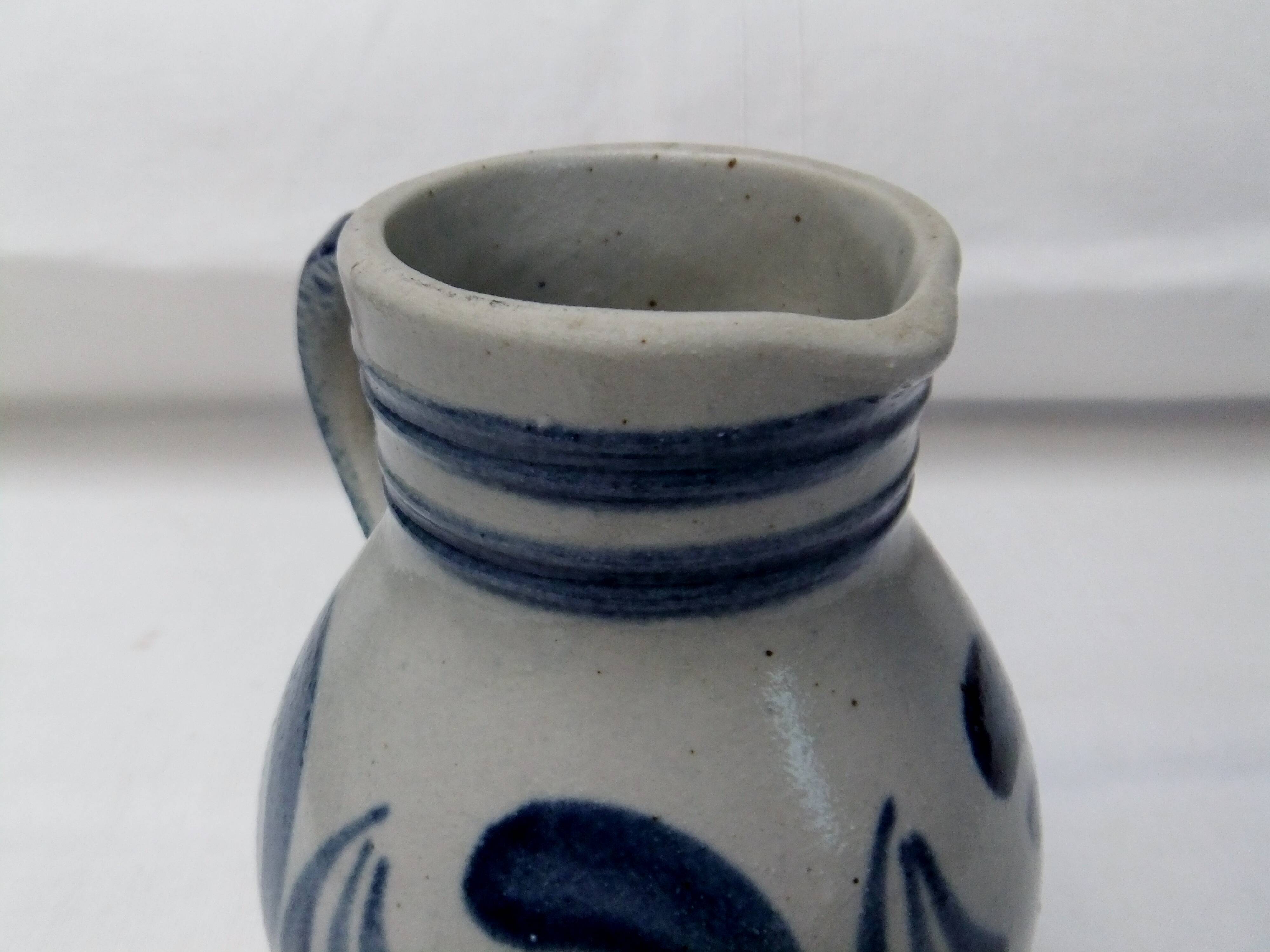 Handmade glazed stoneware pitcher with Handarbeit inscription