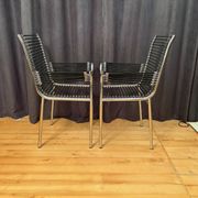 Pair of "Sandows" chairs designed by Rene Herbst, Bauhaus, France, 1980s