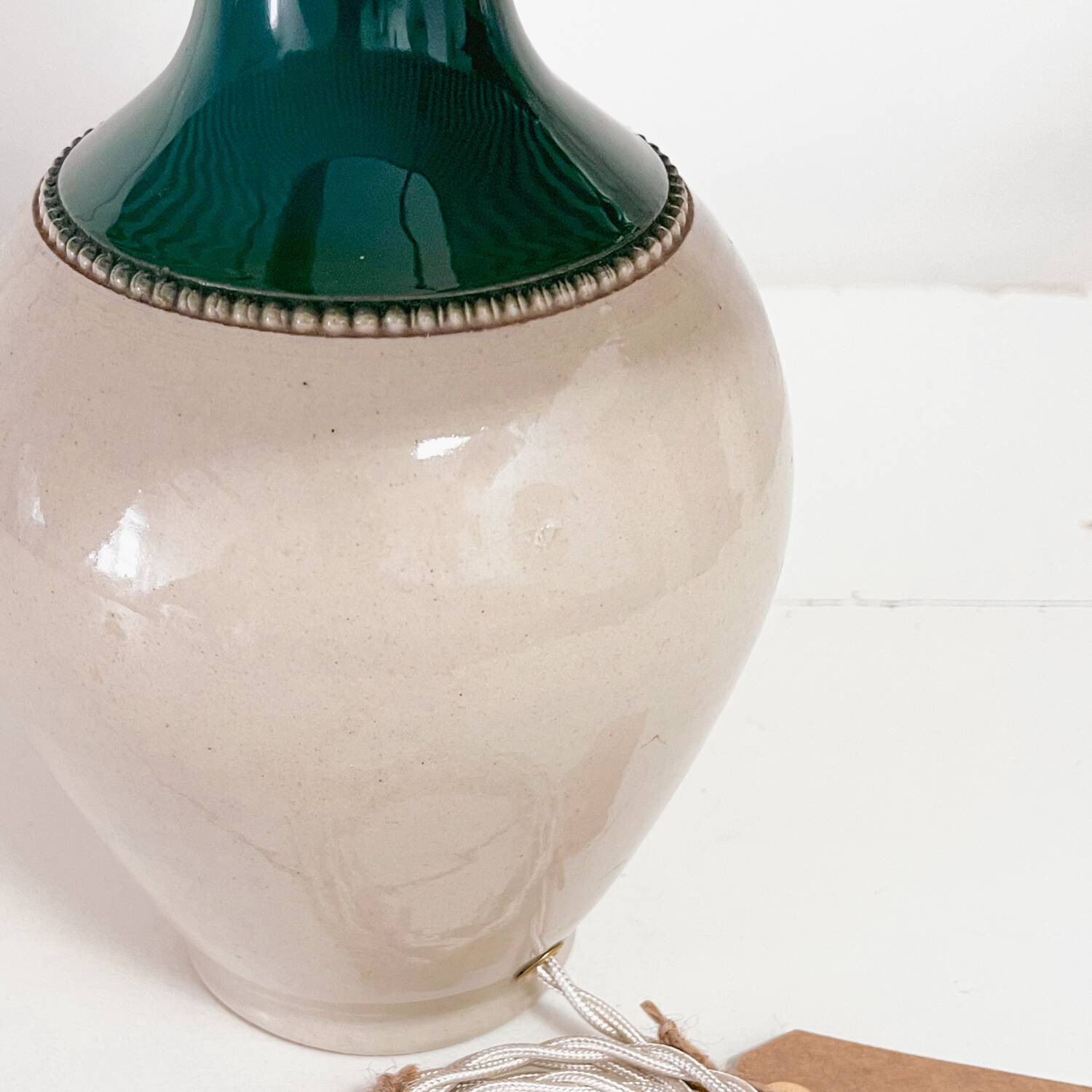 Sandstone lamp and striped lampshade