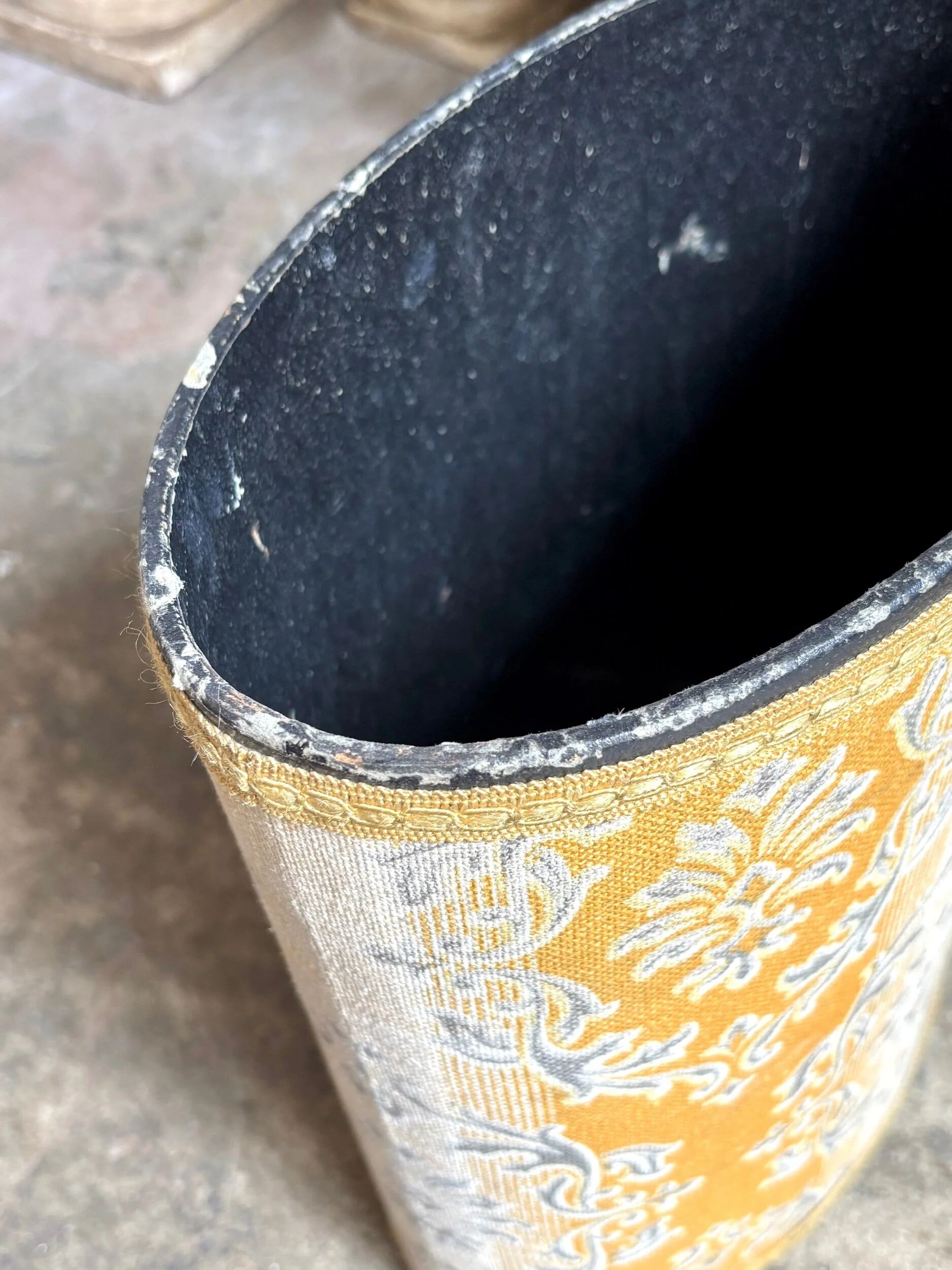 Oval paper bin in woven ochre and grey cotton