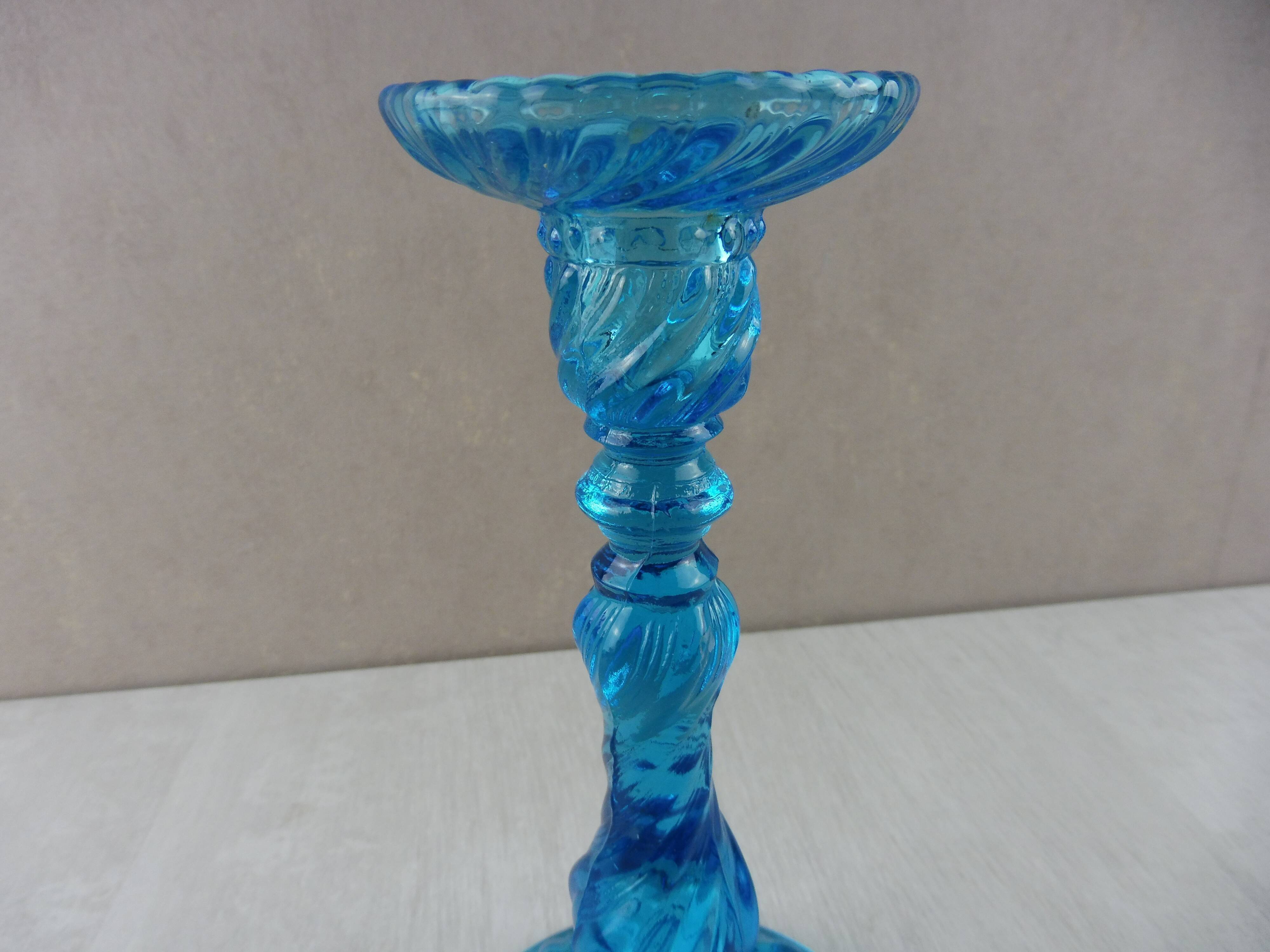 Old candlestick, blue molded glass