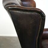 Fauteuil à oreilles en cuir de vache de style anglais avec des couleurs uniques et un excellent confort