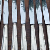 Set of 11 large silver metal knives