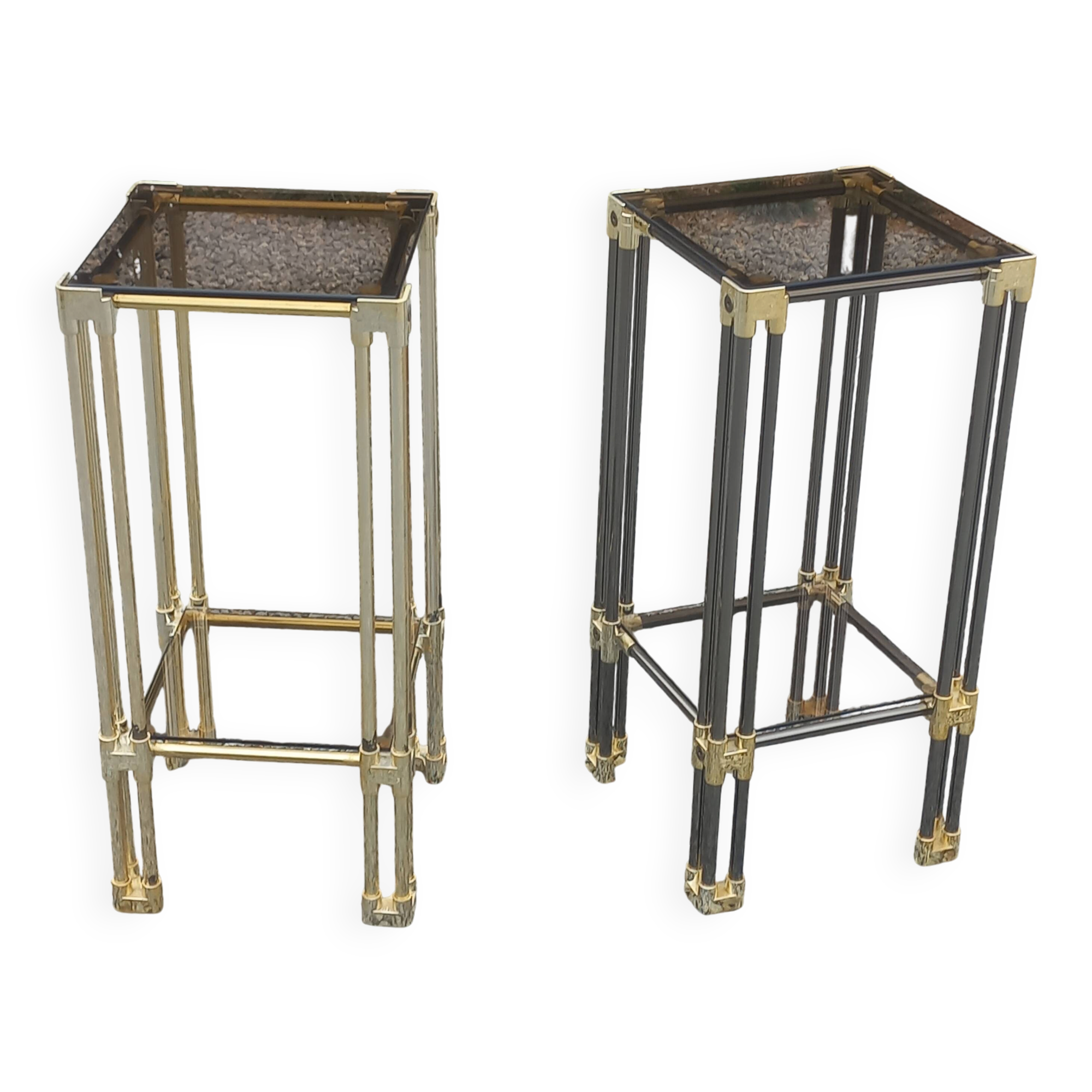 Pair of Hollywood Regency side tables in gold metal and smoked glass.