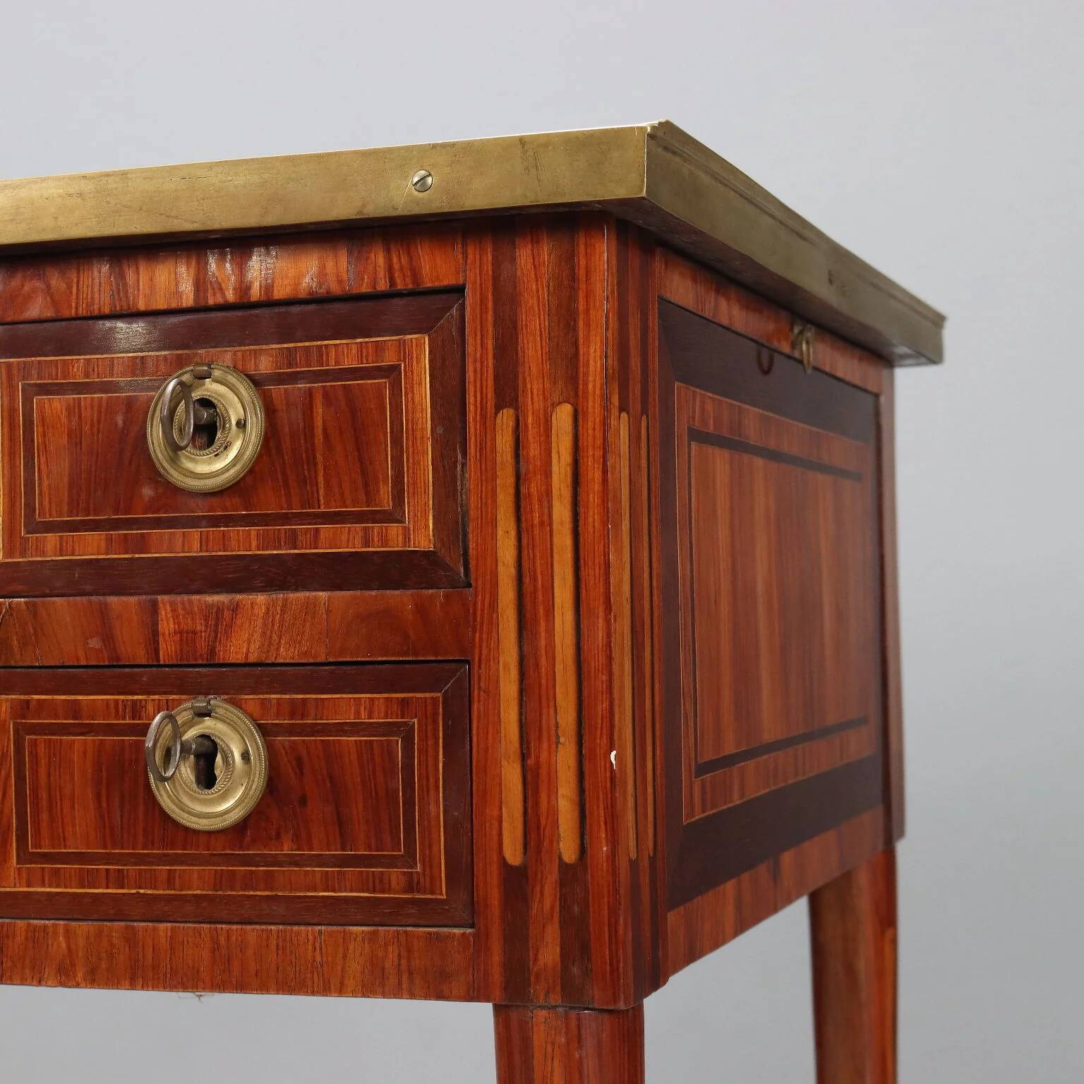 Neoclassical writing desk made of violet wood, 18th century.