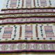 Handmade Berber kilim rug with multicoloured tribal motifs.