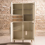 Cupboard equipped with plenty of storage, circa 1950