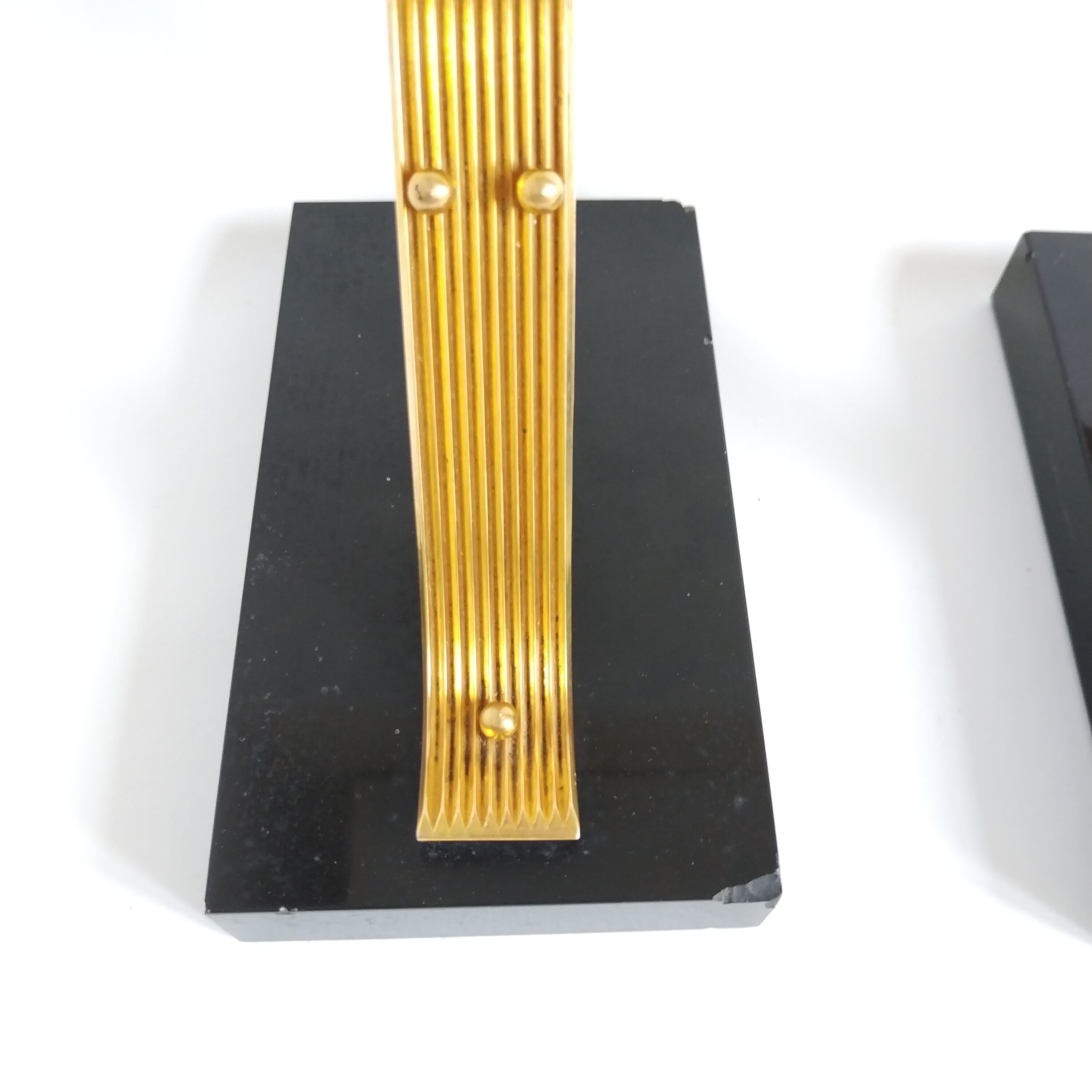 Pair of vintage Art Deco style bookends in marble and gold-plated metal
