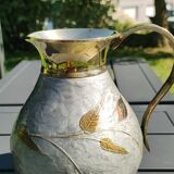 Decorative decanter in solid enamelled brass
