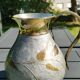 Decorative decanter in solid enamelled brass