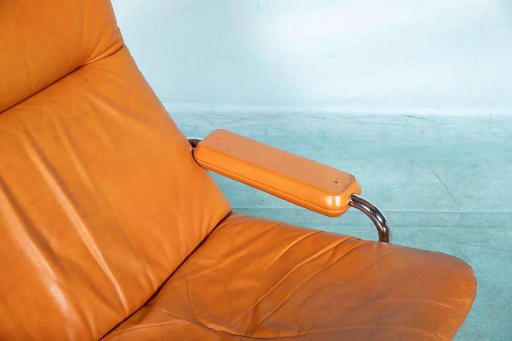 60s cognac leather designer armchair, mid-century modern leather lounge chair.