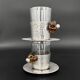 Duo of hammered metal and blown glass cups — handcrafted work