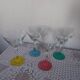 4 colored champagne glasses
