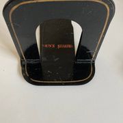 Paire de serre livres Gras de notaire en métal plié 1920