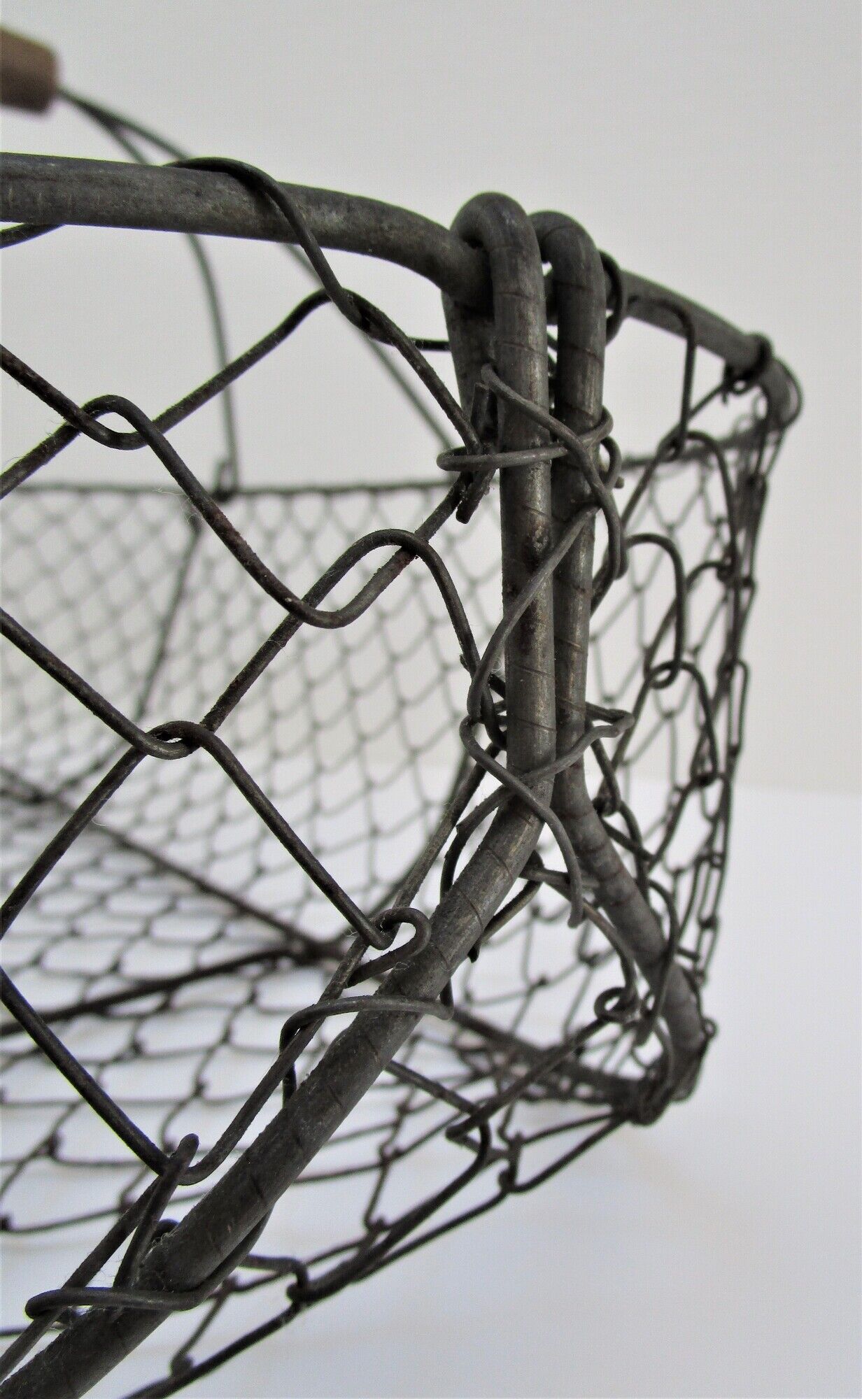 Two baskets metal and patinated wood early twentieth century