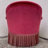 Old raspberry velvet toad armchair
