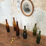 Lot of 6 bottles of bubbled glass.