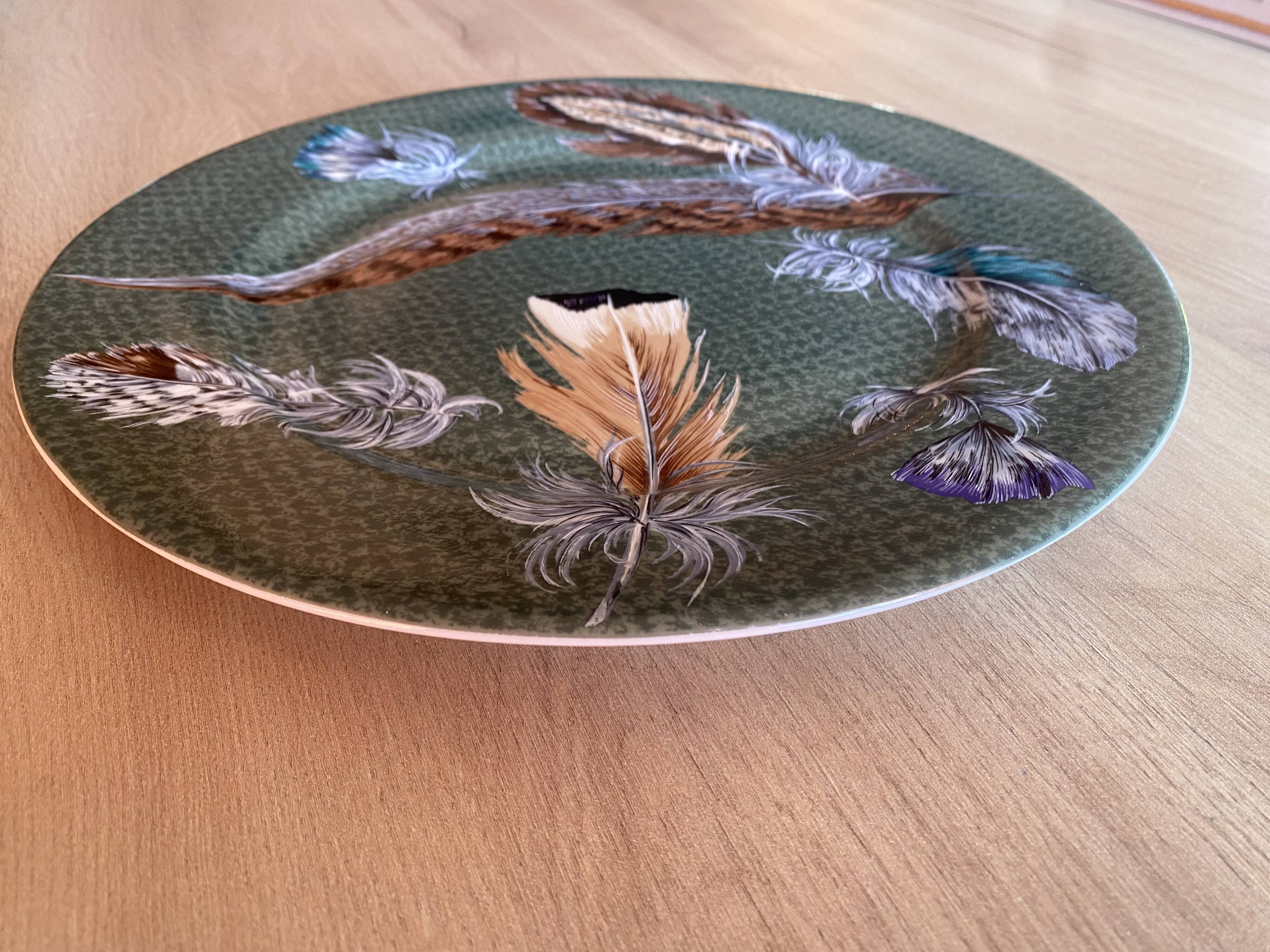 Porcelain plate with feather decoration