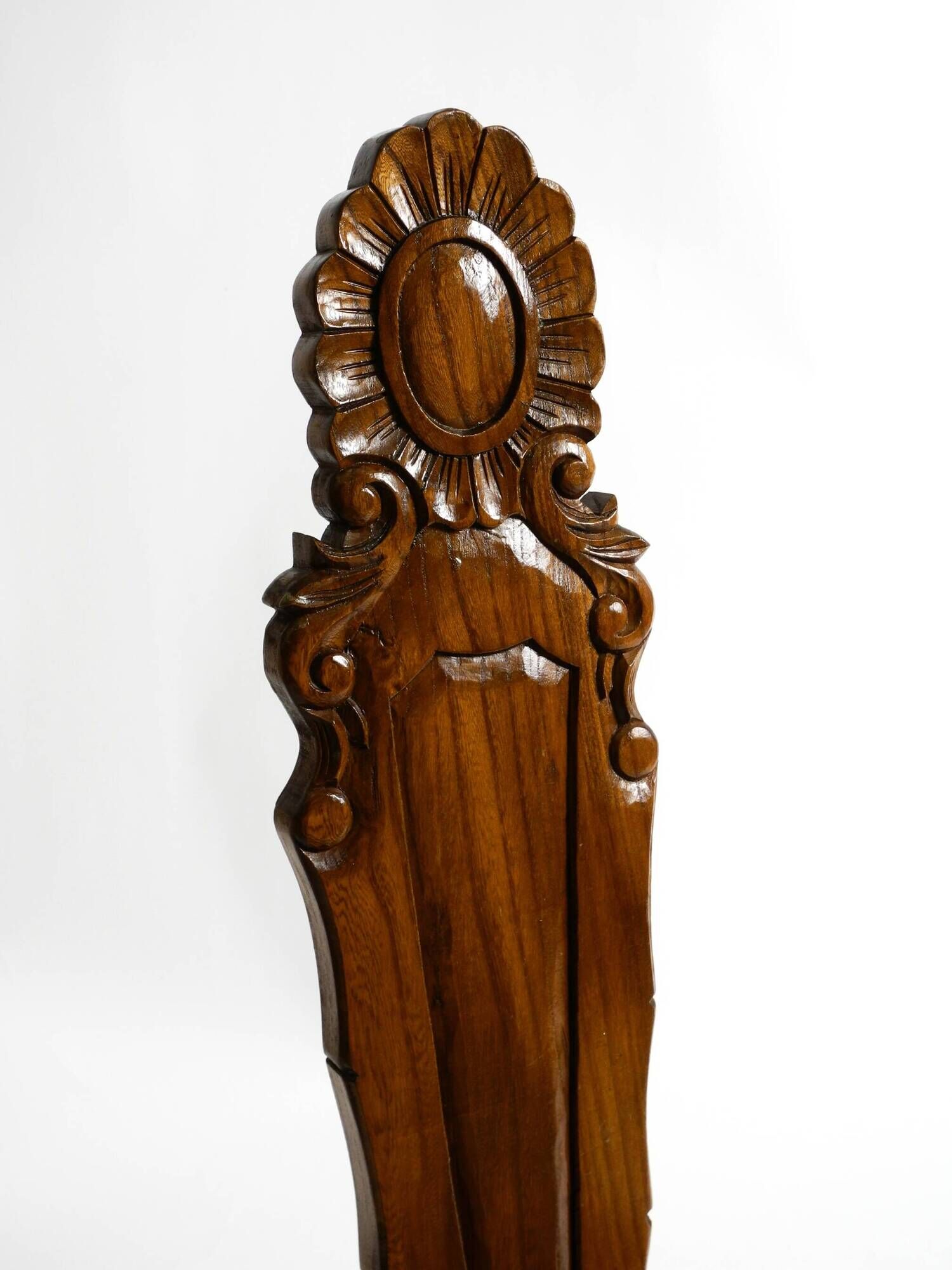 Solid wood chair with an ornate, hand-carved backrest – Made in Spain