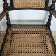 Paire de fauteuils canneés style Louis XIII anciens