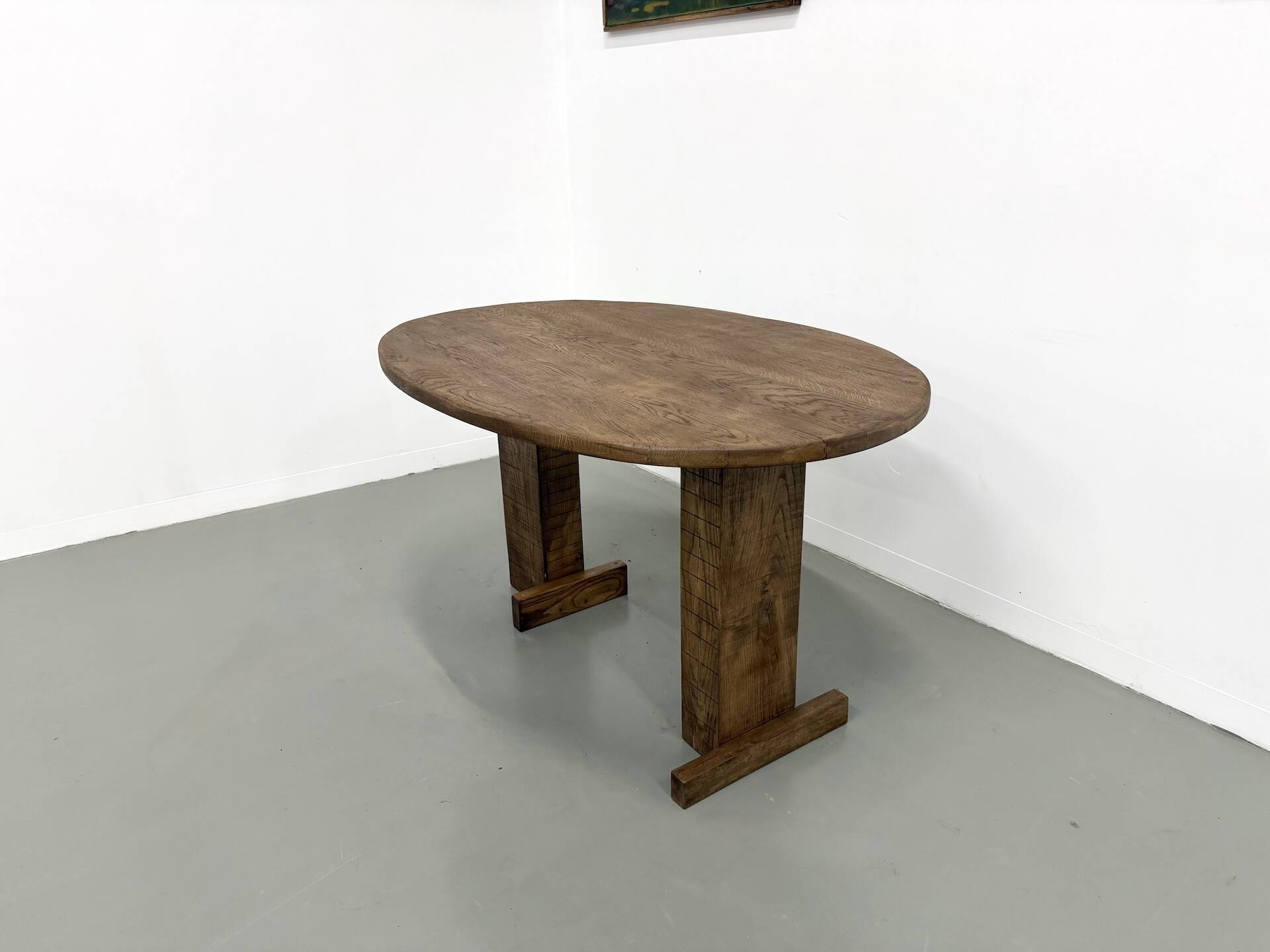 Oval table with T-shaped legs, solid oak, student woodworking project.