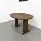Oval table with T-shaped legs, solid oak, student woodworking project.