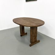 Oval table with T-shaped legs, solid oak, student woodworking project.