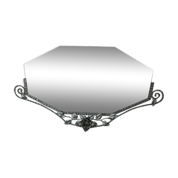 Beveled mirror with art-deco wrought iron frame and floral decor with hanging chain