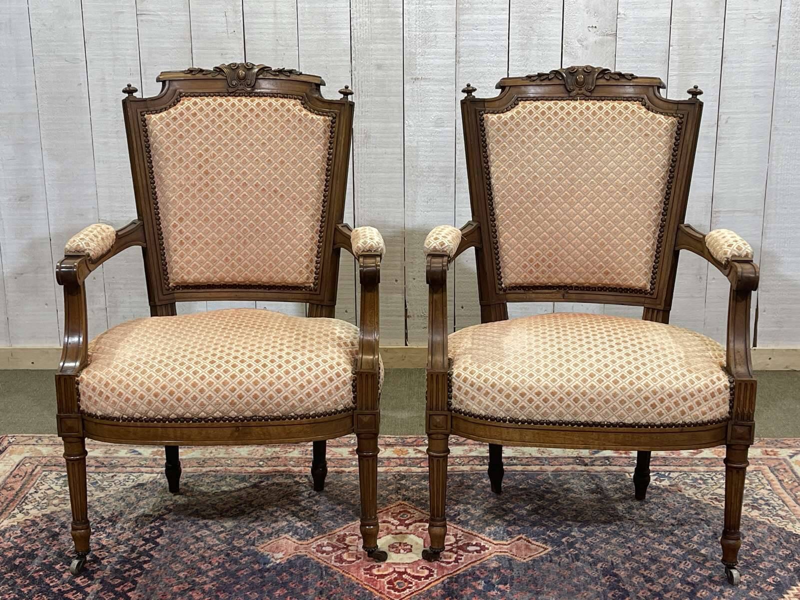 Pair of early 20th century Louis XVI armchairs in walnut