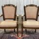 Paire de fauteuils Louis XVI début XXème en noyer