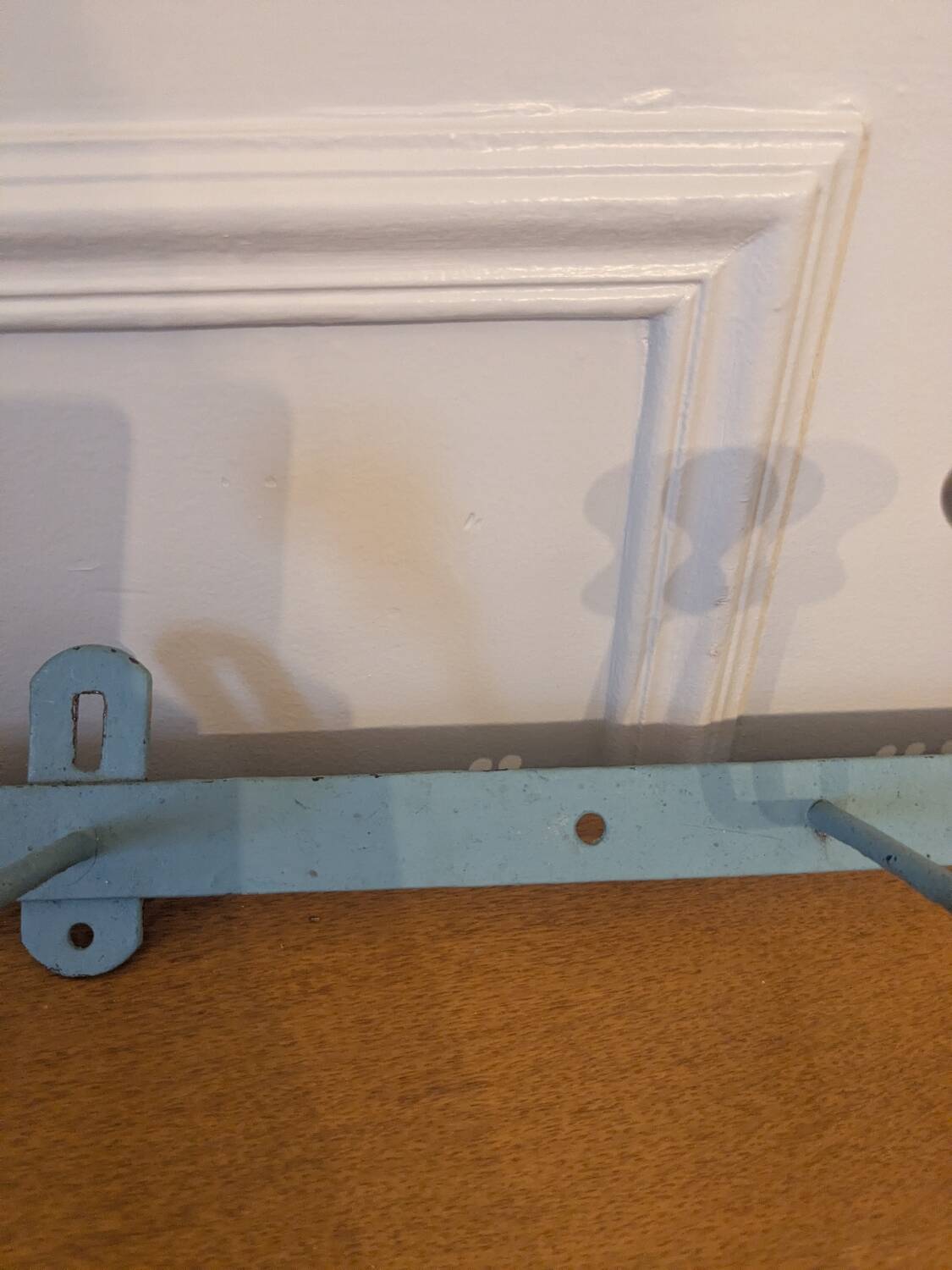 Vintage wall-mounted coat rack